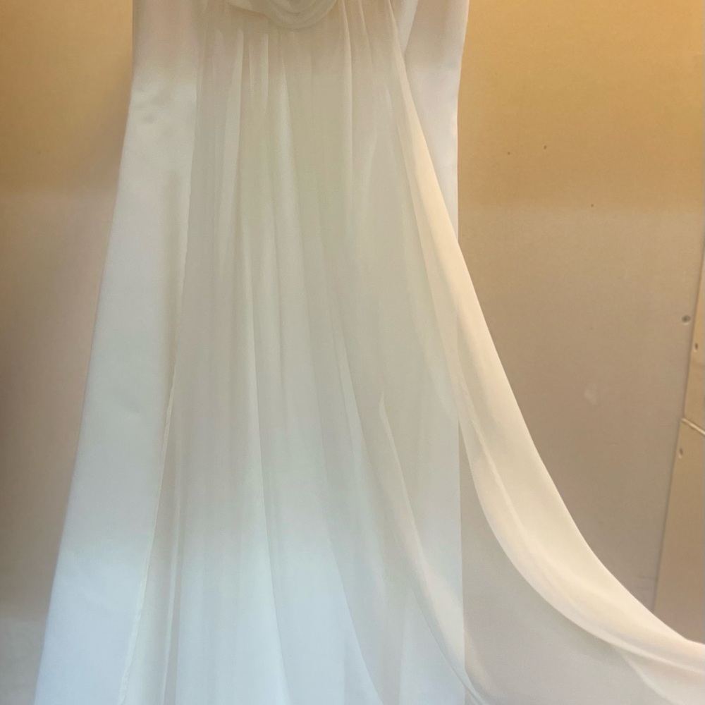 Elegant White first communion or flower girl dress with matching cropped jacket.